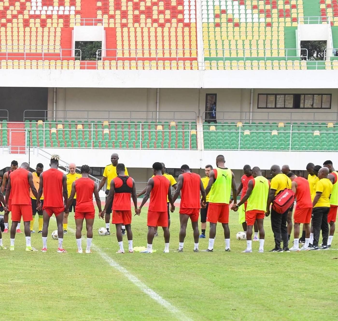 Lucas in the center circle with the Togo national team